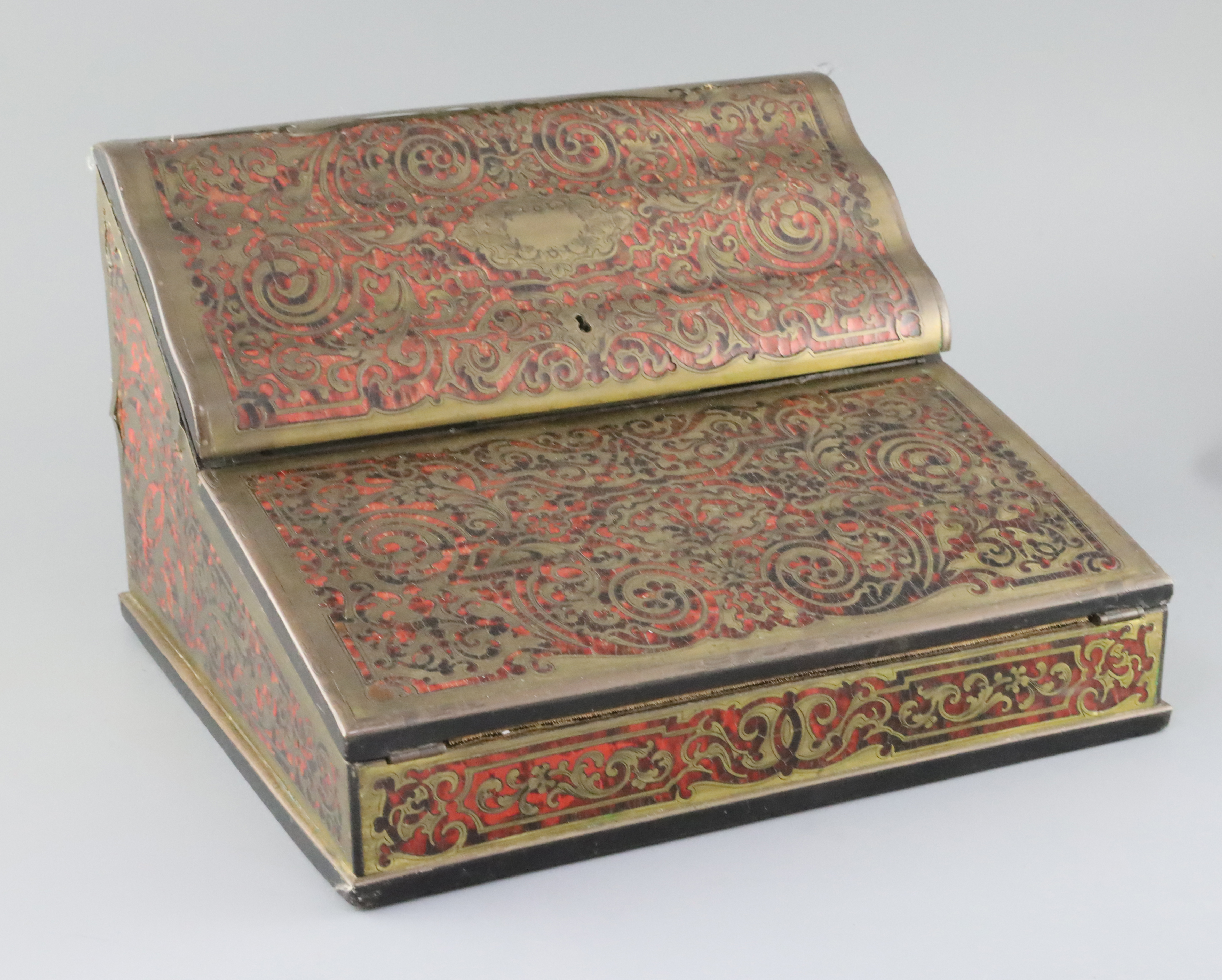 An early 20th century French red boulle work lap desk, width 13in. depth 11.5in. height 8in.